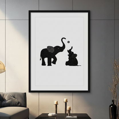Black framed minimalist wall art print of mother and baby elephant silhouettes playing with a ball, displayed in modern living room