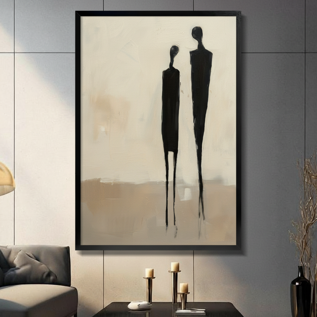 Minimalist abstract couple framed canvas print on dark grey stone wall above candles - elegant black figurative wall art for contemporary living room