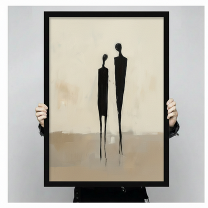 Hands holding large framed abstract couple silhouette canvas print - minimalist black figurative wall art on cream textured background