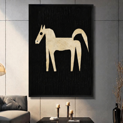 Abstract minimalist horse wall art in black framed canvas displayed in a moody living room with candlelight