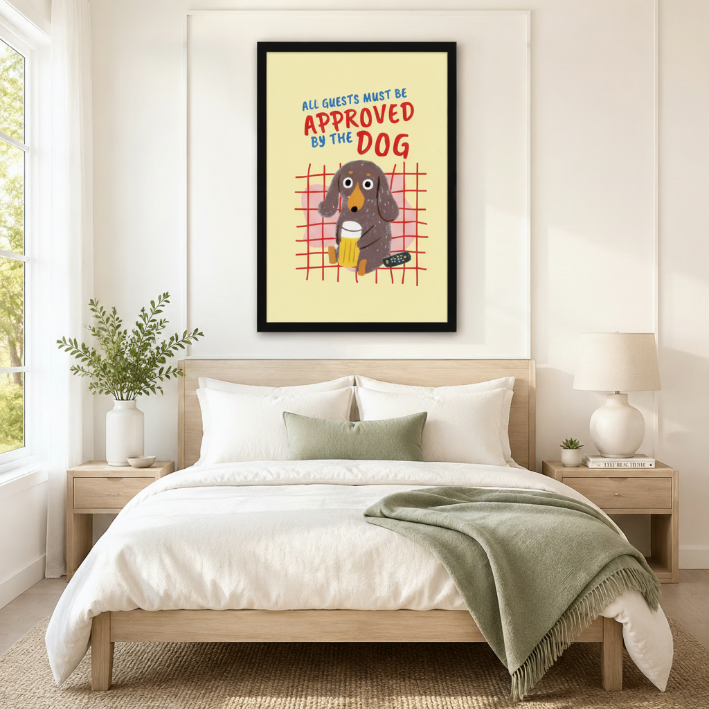 Cute dachshund quote print in black frame hung above a neutral-toned bed in a minimalist bedroom – funny dog wall art for home