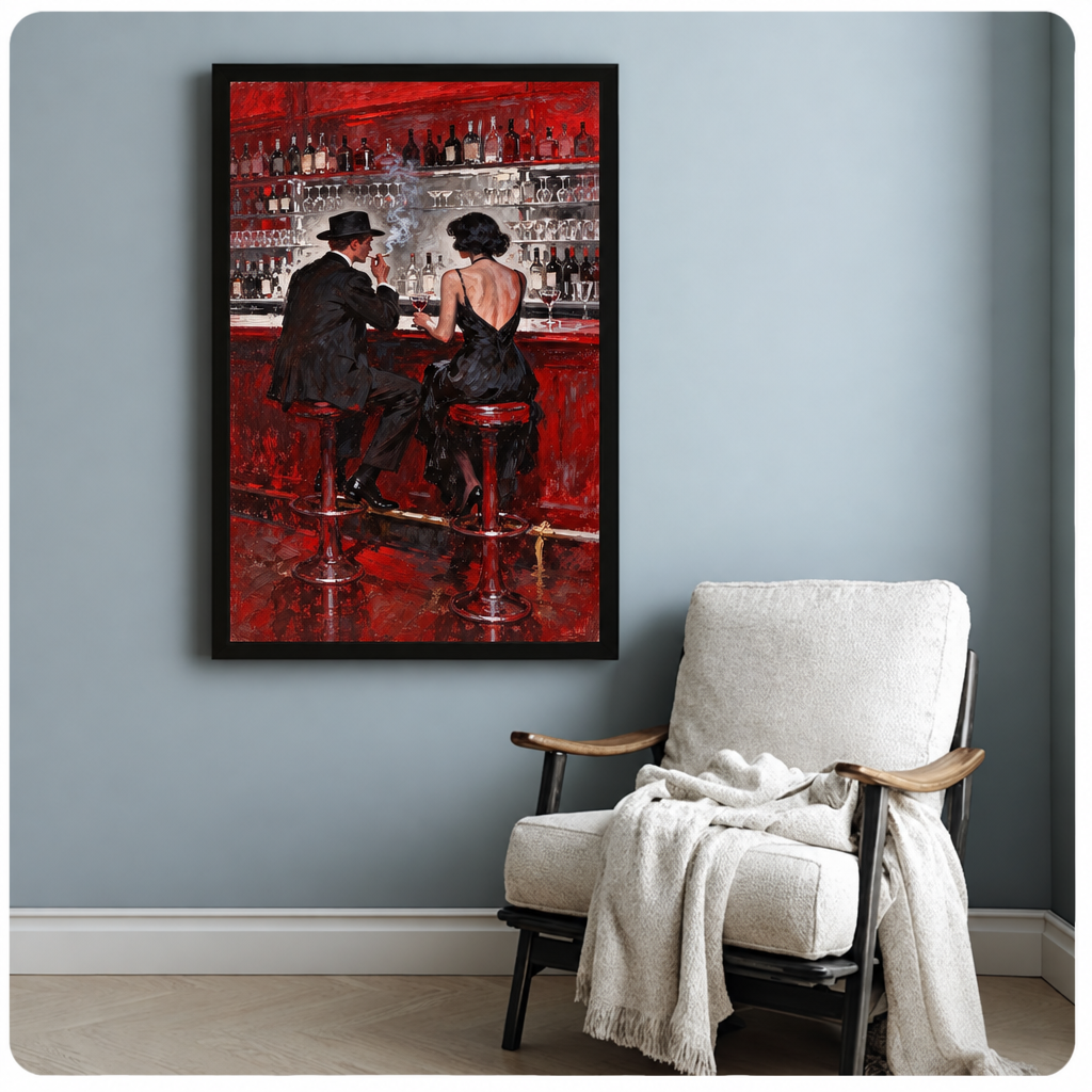 Vintage bar couple canvas wall art in a black frame beside a cream armchair draped with a blanket.