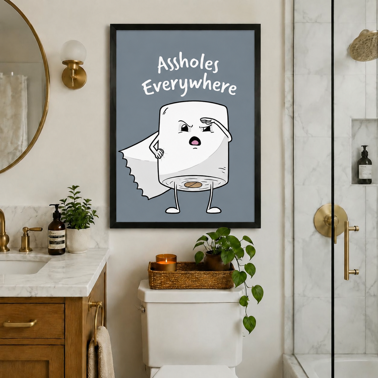 Funny toilet paper cartoon poster in black frame mounted above toilet in an upscale marble bathroom with gold fixtures, reading Assholes Everywhere on a muted blue background
