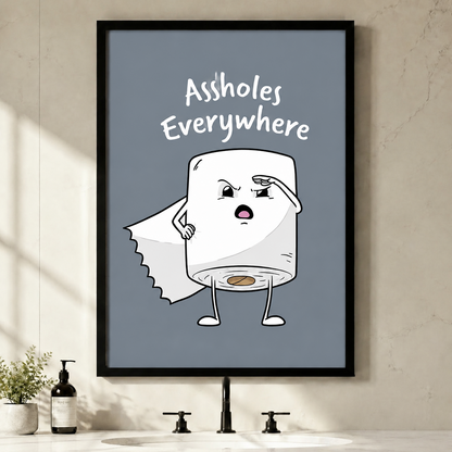 Funny framed bathroom wall art print featuring a cartoon toilet paper roll character with text Assholes Everywhere on slate blue background, displayed above a modern sink