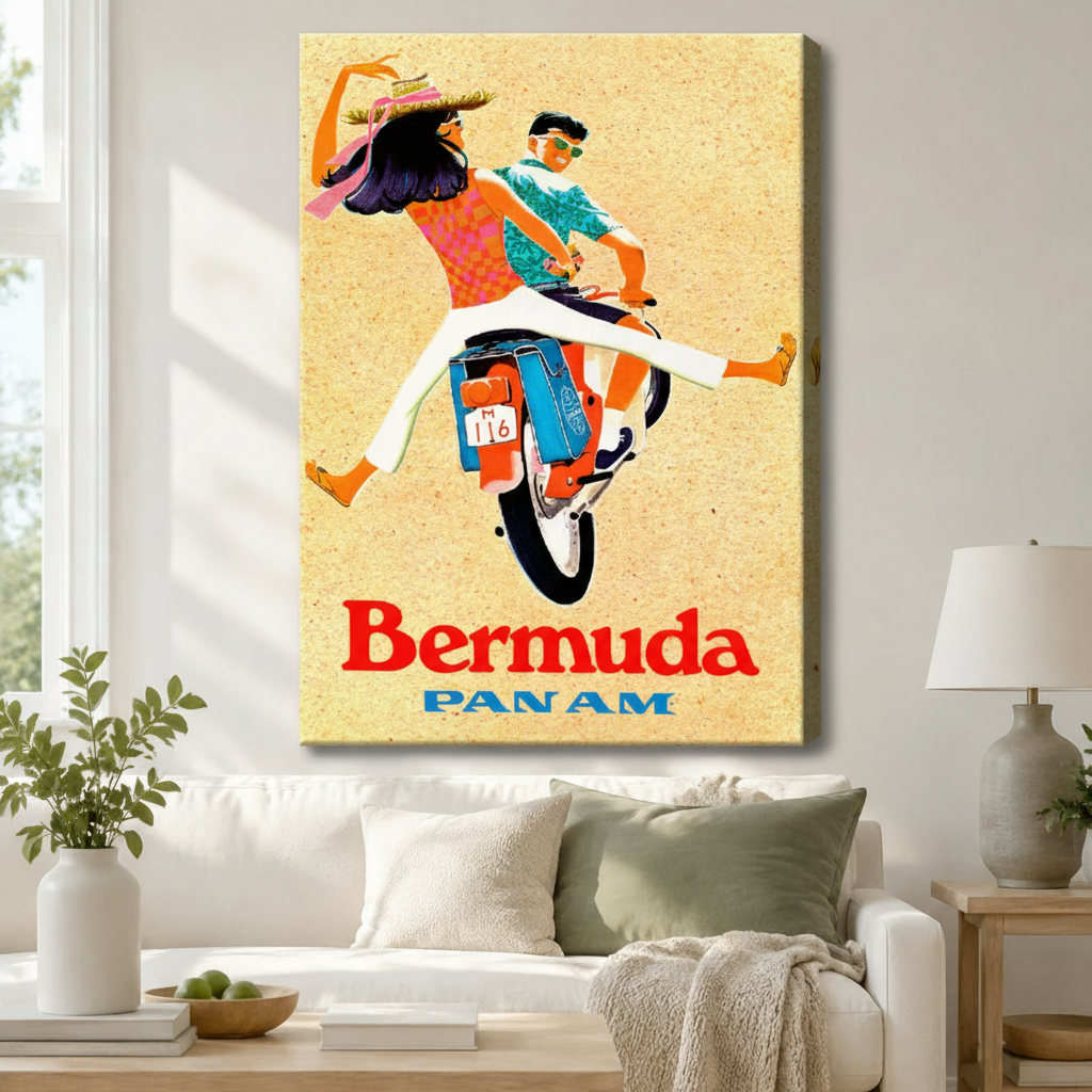 Gallery wrap canvas of a retro Pan Am Bermuda travel poster with a joyful couple on a scooter in bold 1960s illustration style, hung above a white sofa in a cozy living room