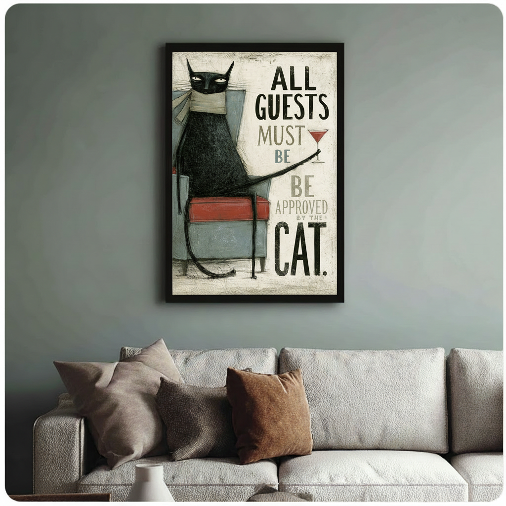 Black cat framed art print hung above sofa - witty cat lover wall decor with martini glass illustration - sage green room setting