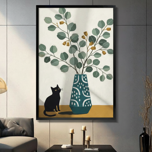 Framed minimalist black cat sitting beside teal eucalyptus vase canvas print on dark grey tile wall in modern living room - elegant black cat and botanical still life wall art with warm mustard base and cream background for contemporary home decor
