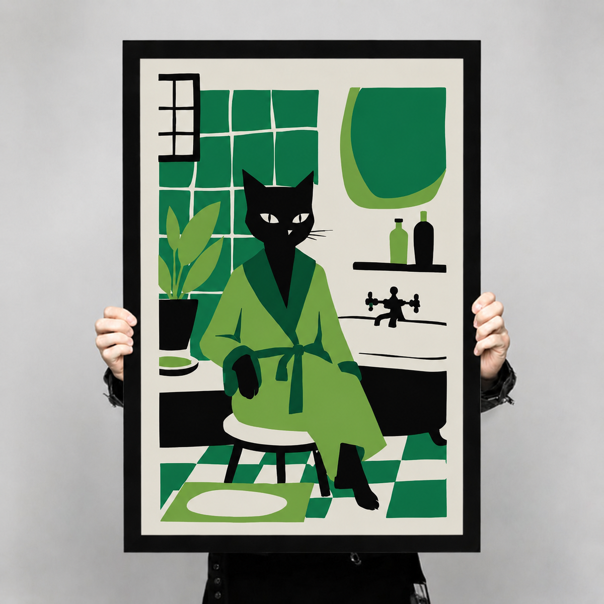 Person holding a large framed black cat in green bathrobe bathroom art print to show scale and size