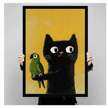 Black framed canvas print featuring a whimsical black cat and green parrot on golden yellow background, hand-held size display