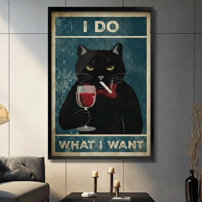 Vintage black cat holding red wine wall art in black frame hung above console table in dark moody living room