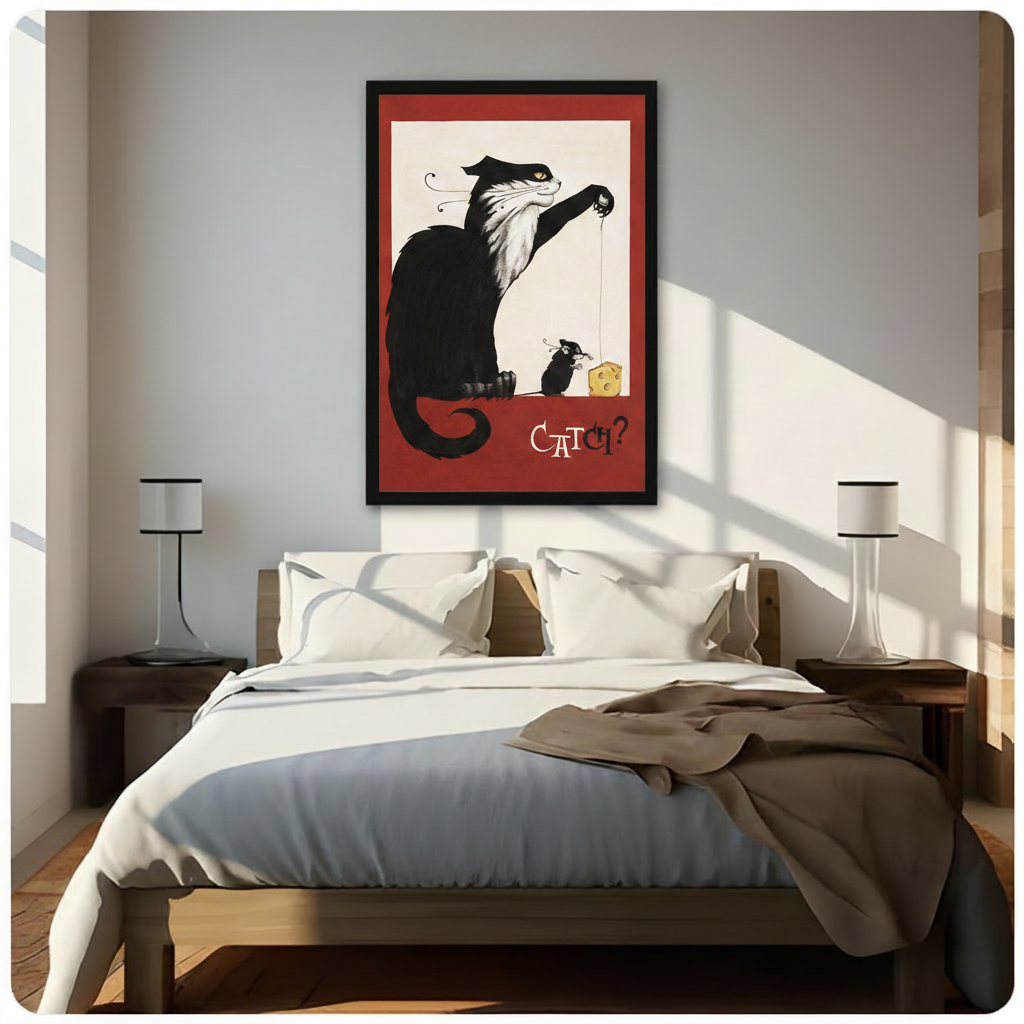 Framed black cat and mouse catch vintage illustration wall art above bed in bright sunlit bedroom with white bedding and wood nightstands