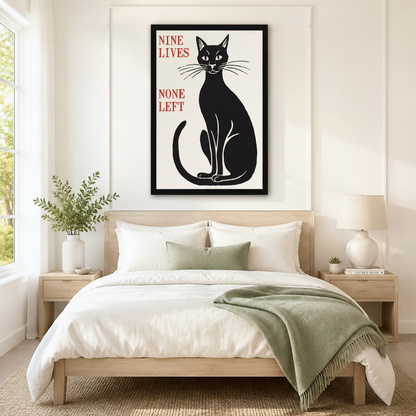 Nine Lives None Left black cat framed canvas art displayed above bed headboard in a cozy modern bedroom