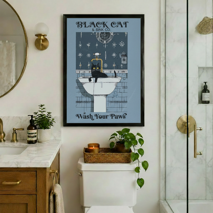 Black Cat Sink Co Wash Your Paws framed canvas in marble bathroom with gold sconce round mirror and glass shower - vintage cat bathroom wall art with gothic typography steel blue background and brass faucet pedestal sink illustration