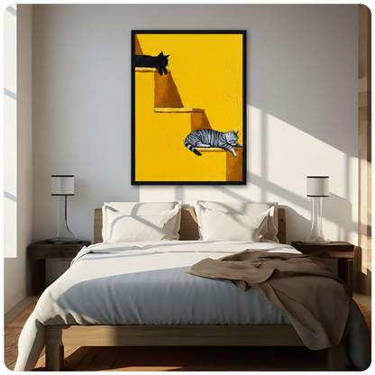 Black cat and tabby cat yellow stairs framed wall art hanging above bed in bright sunlit modern bedroom