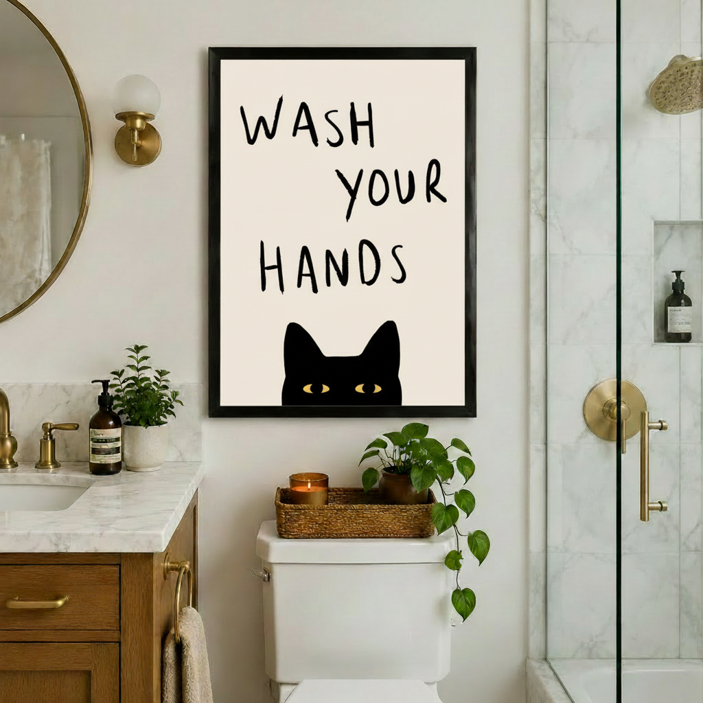 Black cat wash your hands framed art print above toilet in marble bathroom with brass fixtures - funny cat quote wall decor for powder room