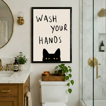 Black cat wash your hands framed art print above toilet in marble bathroom with brass fixtures - funny cat quote wall decor for powder room
