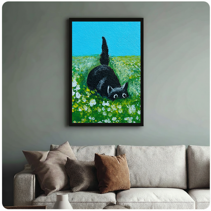 Funny cat poster in black frame above sofa — black cat rolling in wildflower field, quirky pet wall art