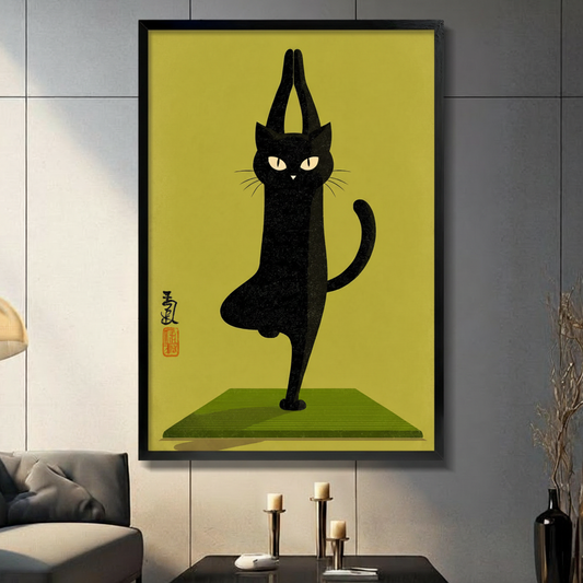 Framed canvas wall art of a black cat doing yoga tree pose on a green mat, olive yellow background, displayed in a modern living room