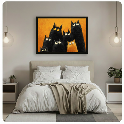 Fluffy black and orange cats with giant expressive eyes on a warm orange background cute cat wall art framed print above a bedroom with white linen bedding white nightstands potted plants and glass pendant lights