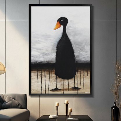 Black framed expressionist black duck with orange beak canvas art with a tall slender black duck with a small round head and vivid orange beak standing upright on spindly legs with dark paint drips pooling beneath its feet against a moody brushed gray and warm sandy beige oil-painted background, hung on a dark gray tiled wall above a gray sofa with a gold arc floor lamp