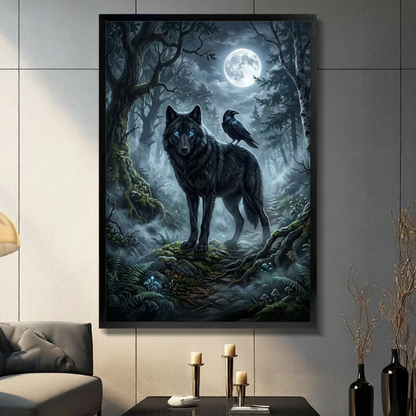 Framed gothic wall art print of a black wolf with glowing blue eyes and a raven perched on its back standing in a moonlit misty forest, displayed in a modern living room above a console table