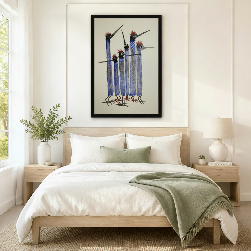 Whimsical blue elongated bird flock black framed art print above neutral linen bed in serene Scandinavian bedroom

