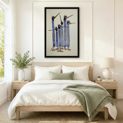 Whimsical blue elongated bird flock black framed art print above neutral linen bed in serene Scandinavian bedroom

