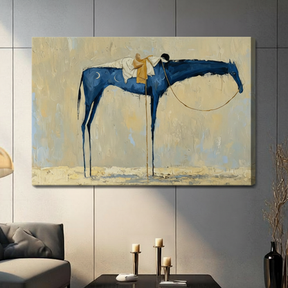 Gallery wrap stretched canvas of a surrealist blue horse with elongated legs and white robed rider hung frameless on a dark gray tiled wall above candlestick holders and black decorative vase