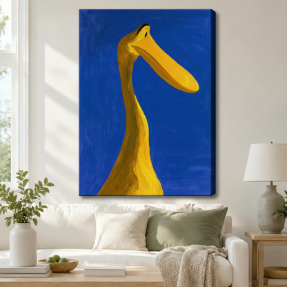 Stretched canvas wall art of a striking modern expressionist yellow duck neck portrait featuring an extreme upward-angle close-up of a long sinuous golden yellow bird neck curving upward with a broad flat beak pointing right and a tiny black eye on a saturated cobalt blue thick impasto background with visible brushwork, hung above a white sofa with sage green and cream pillows and a white ceramic table lamp in a bright airy living room