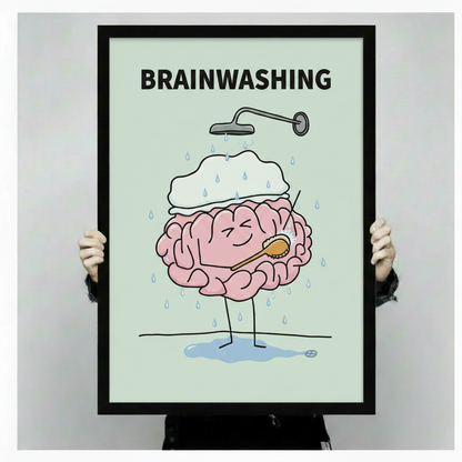 Hands holding a large black framed funny brainwashing brain shower canvas art print against a neutral gray background, front-facing product display