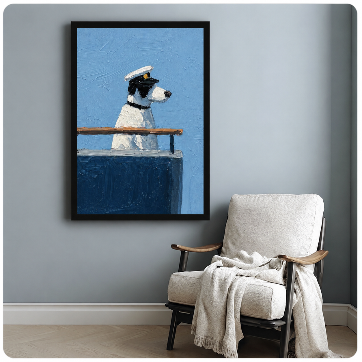 Oil painting wall art of a dog captain on a ship deck, framed in black and displayed beside a white armchair on a gray wall