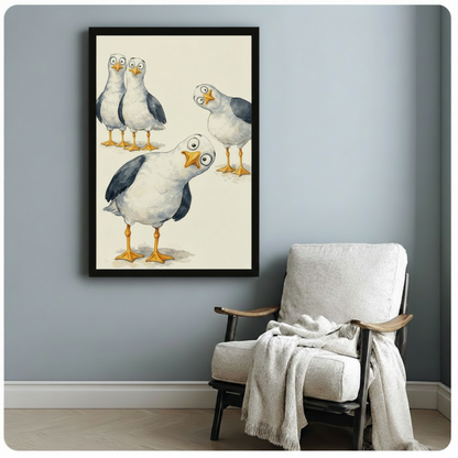 Framed watercolor seagull wall art print with expressive cartoon birds on a cream background, hanging on a light blue-gray wall beside a white linen armchair with a draped throw blanket