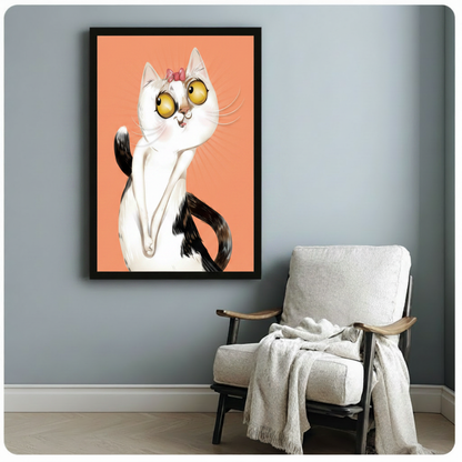 Quirky framed art print of a curious white cat with giant yellow eyes and a pink bow, styled beside a cozy armchair in a grey room