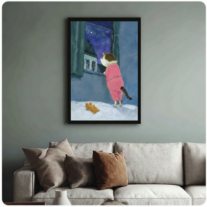 Black framed cat in pink pajamas starry night art print styled above a neutral linen sofa on a sage green wall in a cosy living room