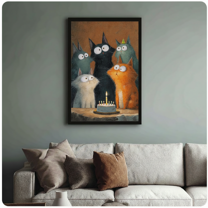 Black framed cat birthday party wall art above sofa – five expressive big-eyed cats around a celebration cake – whimsical funny pet poster for living room decor