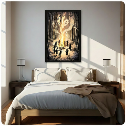 Black framed dramatic gothic Halloween illustration of nine dancing black cat silhouettes surrounding a blazing bonfire with ethereal white ghost faces emerging from the fire in a dark enchanted forest with twisted bare branches and scattered wildflowers dark fantasy canvas wall art on warm golden brown background hung in bright diagonal sunlight above a wood-frame bed with white linen bedding