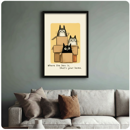 Framed cartoon cat box print hung above sofa on sage green wall – whimsical cat home décor with quote