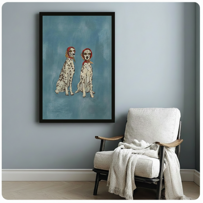 Chic Dalmatian duo black float frame canvas art on blue-gray wall beside white linen armchair with throw blanket and wood floor