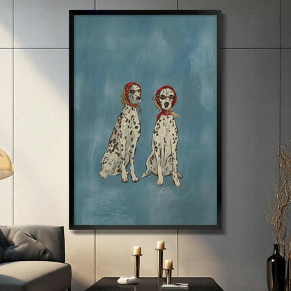 Chic Dalmatian duo in red headscarves black float frame canvas wall art on gray tile wall above dark console table with candles and dried botanicals