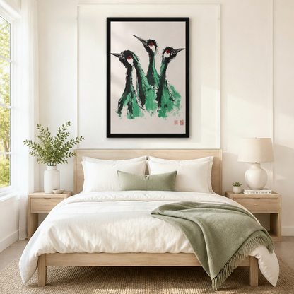 Three green ink-wash cranes with red eyes framed canvas print above oak bed with sage green throw, elegant Japandi bedroom wall art