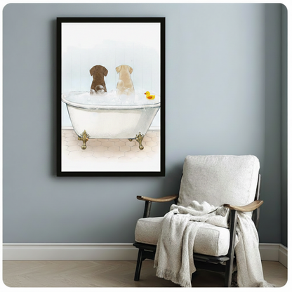 Chocolate and yellow Labrador bathing in white clawfoot tub with yellow rubber duck framed watercolour illustration beside white linen wood armchair on blue grey wall – gold claw feet hexagon tile funny dog canvas art for reading corner