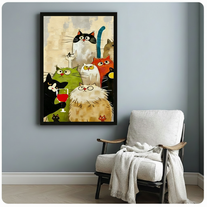 Colorful cartoon cat party framed print on blue-gray wall above white linen armchair with throw blanket