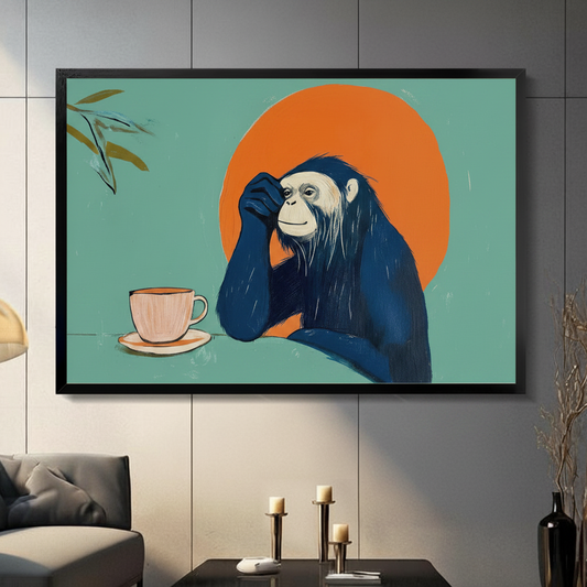 Framed wall art print of a contemplative chimpanzee sitting with a coffee cup against a bold orange sun on teal background, displayed in a modern living room