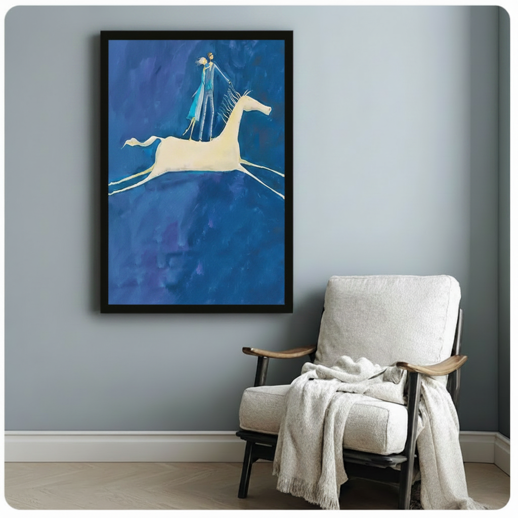 Black framed figurative art print showing couple standing on white horse in full gallop on deep blue oil painting background, styled beside white linen armchair on blue-grey wall