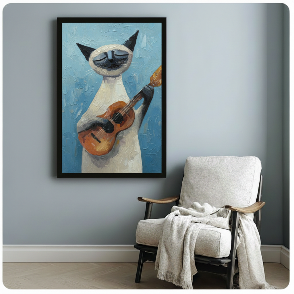 Black framed cubist style oil painting cream and dark point Siamese cat holding warm honey brown acoustic guitar with elongated neck raised upward eyes serenely closed against layered cerulean blue impasto background canvas print on pale blue-grey wall beside white wood arm lounge chair with draped cream linen throw - bold Siamese cat guitar music blue wall art for cozy reading nook decor