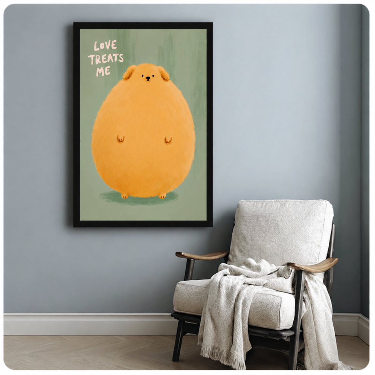 Black framed cute Pomeranian wall art with humorous "Love Treats Me" quote on sage green background, styled beside a cozy white armchair with a draped blanket