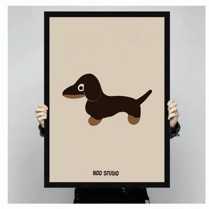 Hands holding a large black framed cute dachshund canvas art print against a neutral light gray background, front-facing product display