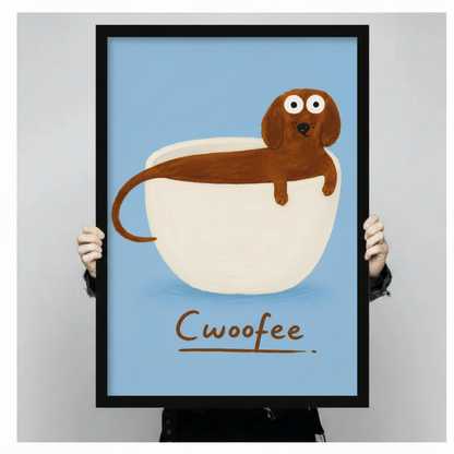 Close-up of Cwoofee dachshund coffee cup illustration art print held by hands showing print detail