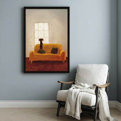 Atmospheric dachshund wall art in black frame hung on blue-grey wall beside white linen armchair in cosy reading nook setting