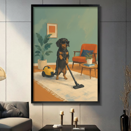 Funny dachshund wearing black sunglasses standing on hind legs vacuuming white rug with yellow vacuum cleaner in retro mid-century modern teal living room with orange armchair and potted plant humorous illustration framed wall art print displayed in a living room with dark gray sofa, pillar candle holders, and black decorative vas